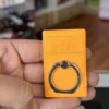 Anillo para celular con encendedor electrico