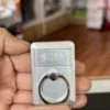 Anillo para celular con encendedor electrico