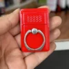 Anillo para celular con encendedor electrico