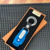 Llavero metalico con encendedor electrico