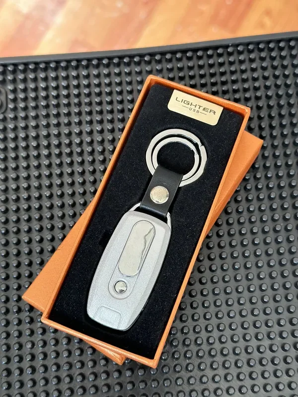 Llavero metalico con encendedor electrico