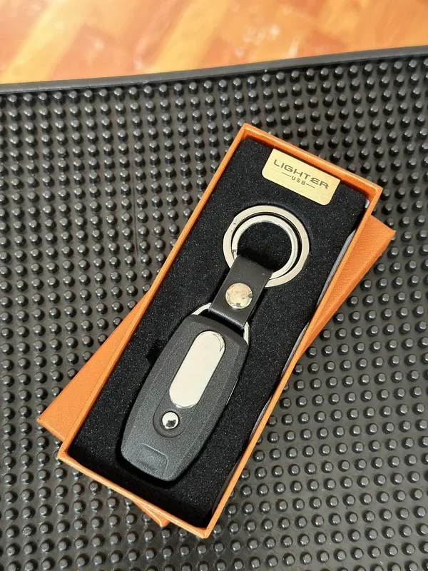 Llavero metalico con encendedor electrico
