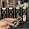 Llavero metalico con encendedor electrico